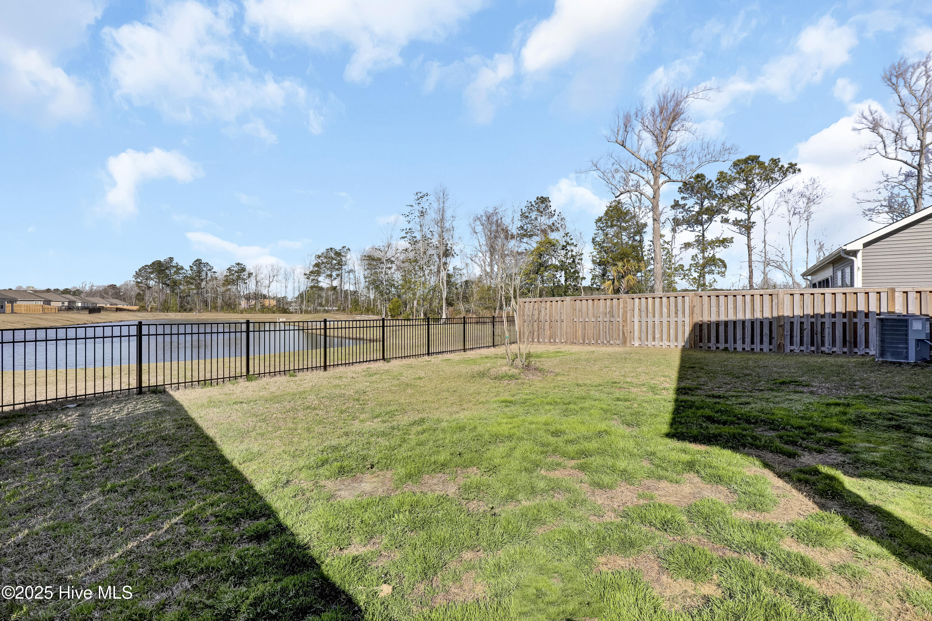 511 Edgewater Way Surf City, NC 28445 - Photo 40 of 61 Backyard, Pond Front