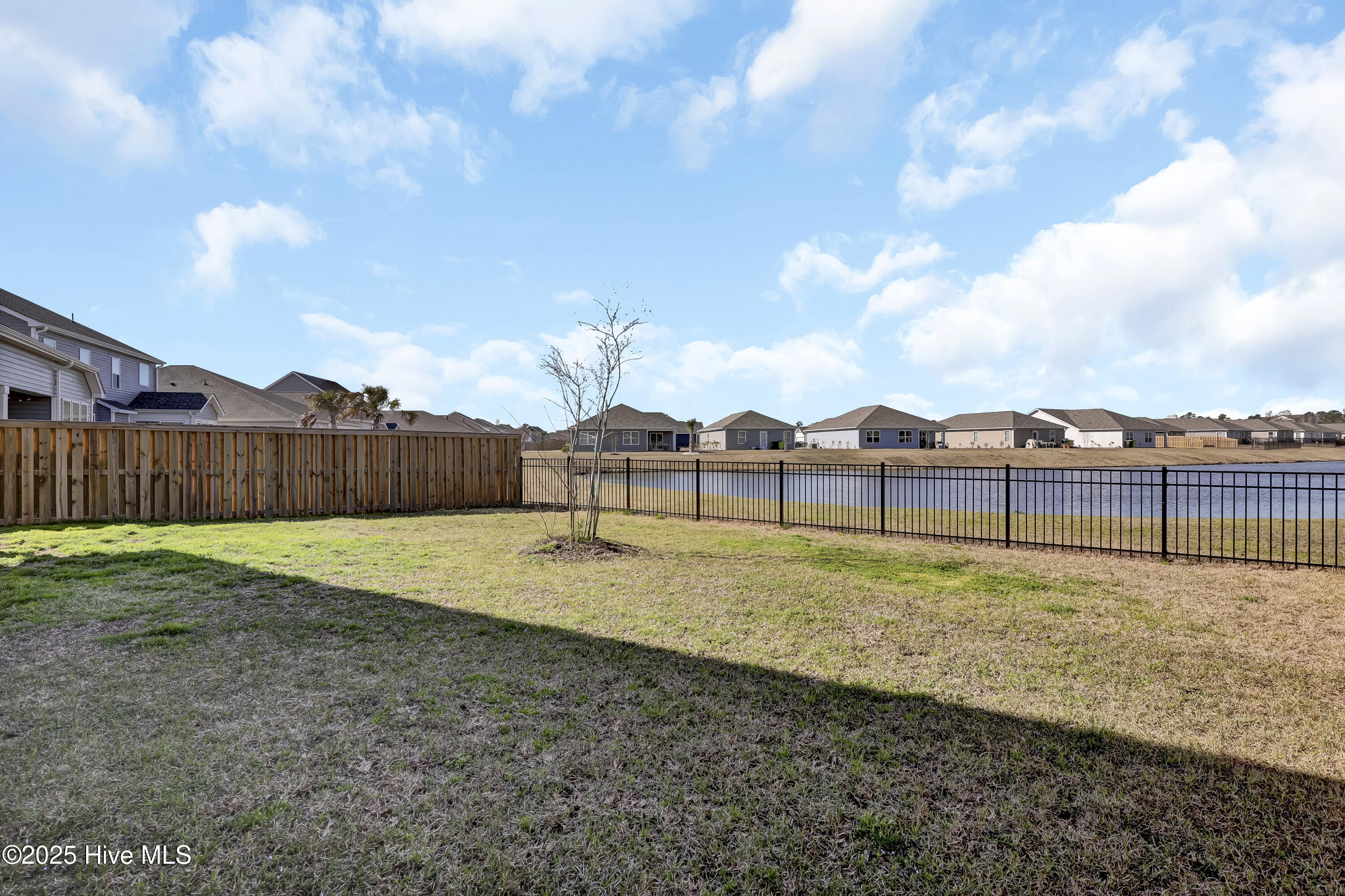 511 Edgewater Way Surf City, NC 28445 - Photo 41 of 61 Backyard, Pond Front