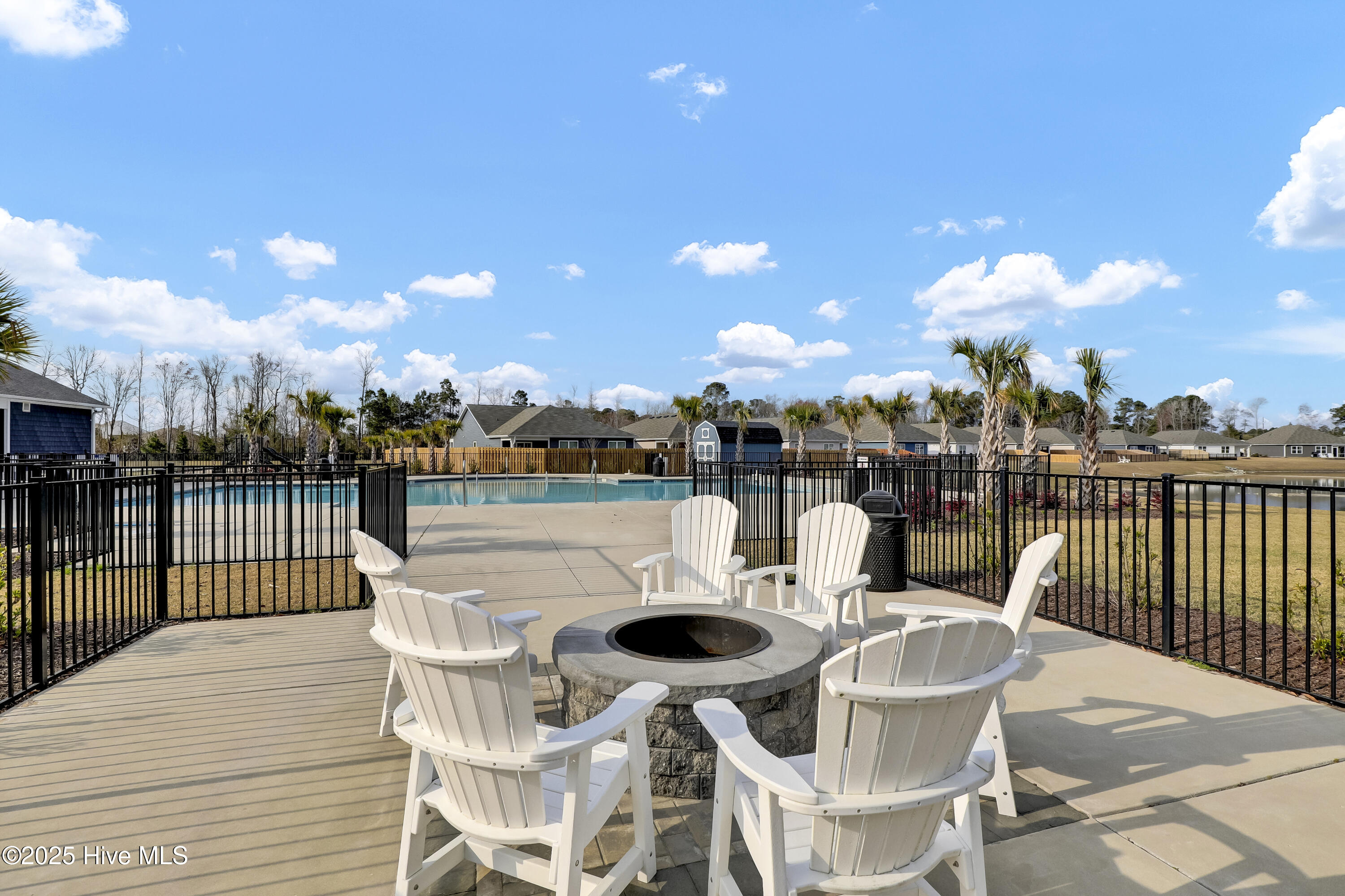 511 Edgewater Way Surf City, NC 28445 - Photo 59 of 61 Poolside Firepit