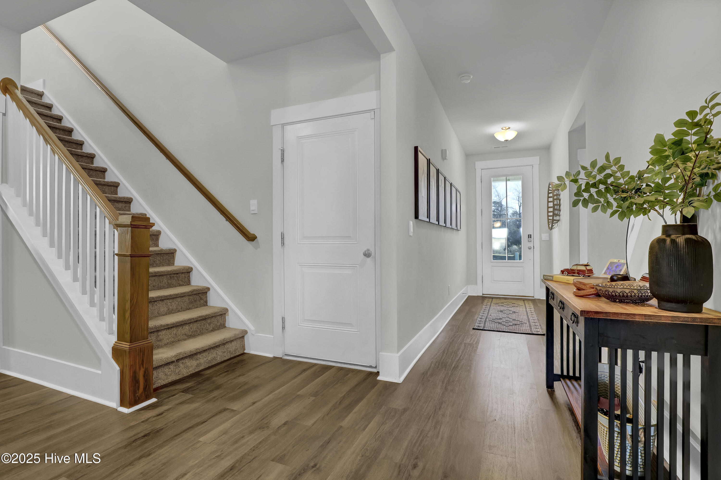 511 Edgewater Way Surf City, NC 28445 - Photo 8 of 61 Stairs to 2 Bonus Rooms