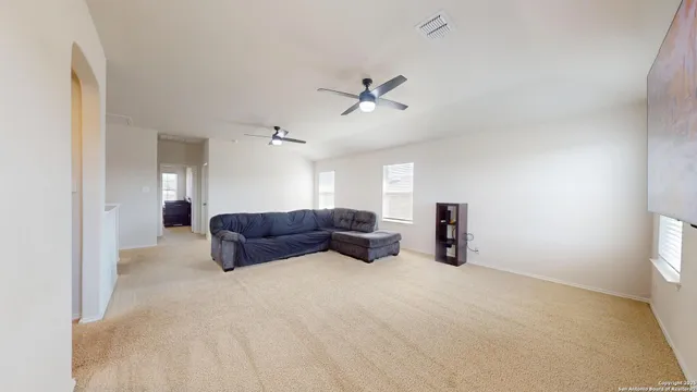 a bedroom with a bed and dresser