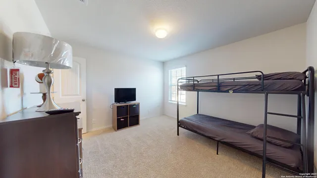 a view of a backyard of the house