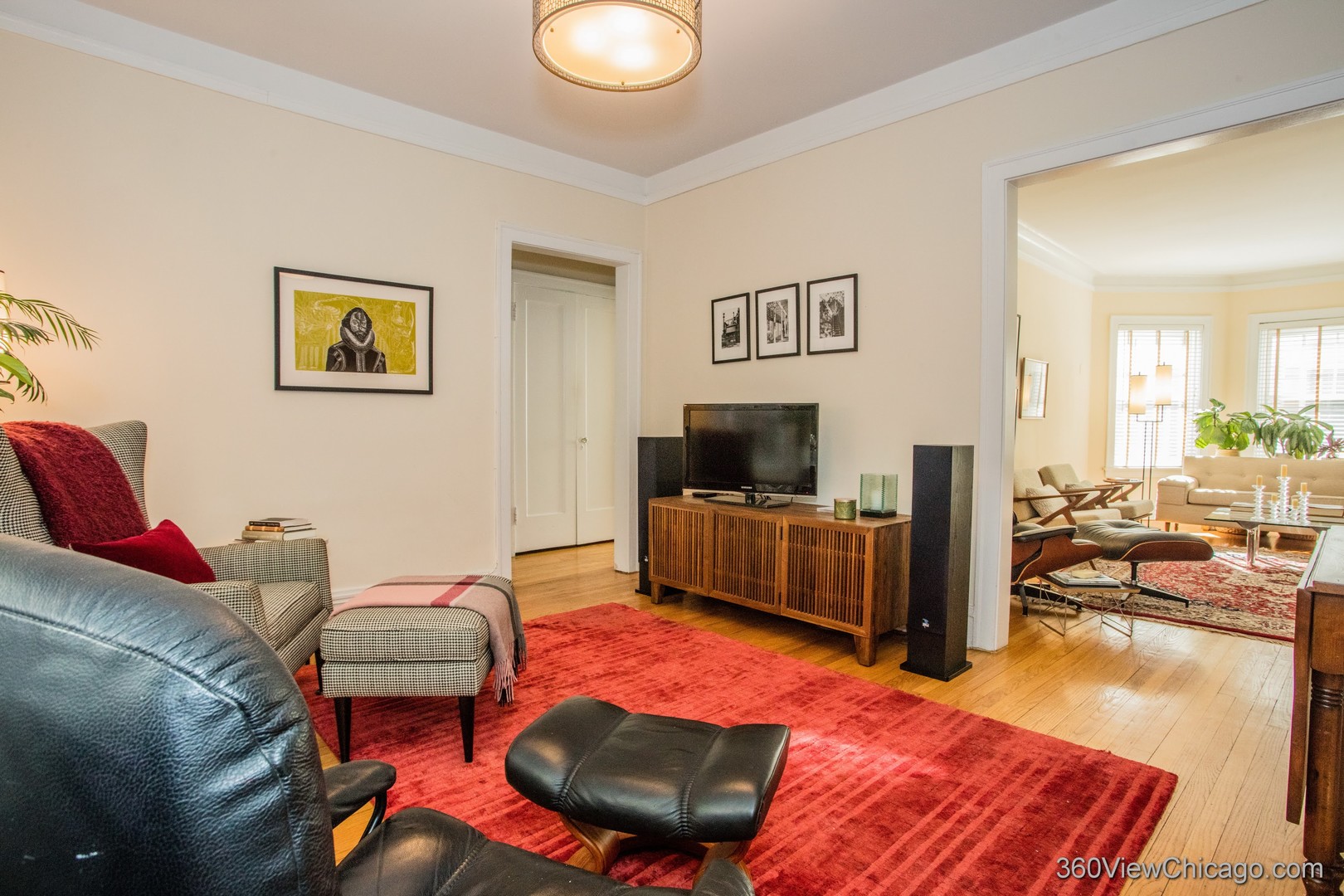 546 West Brompton Avenue, Unit 2S Chicago, IL 60657 - Photo 12 of 17 a living room with furniture and a flat screen tv