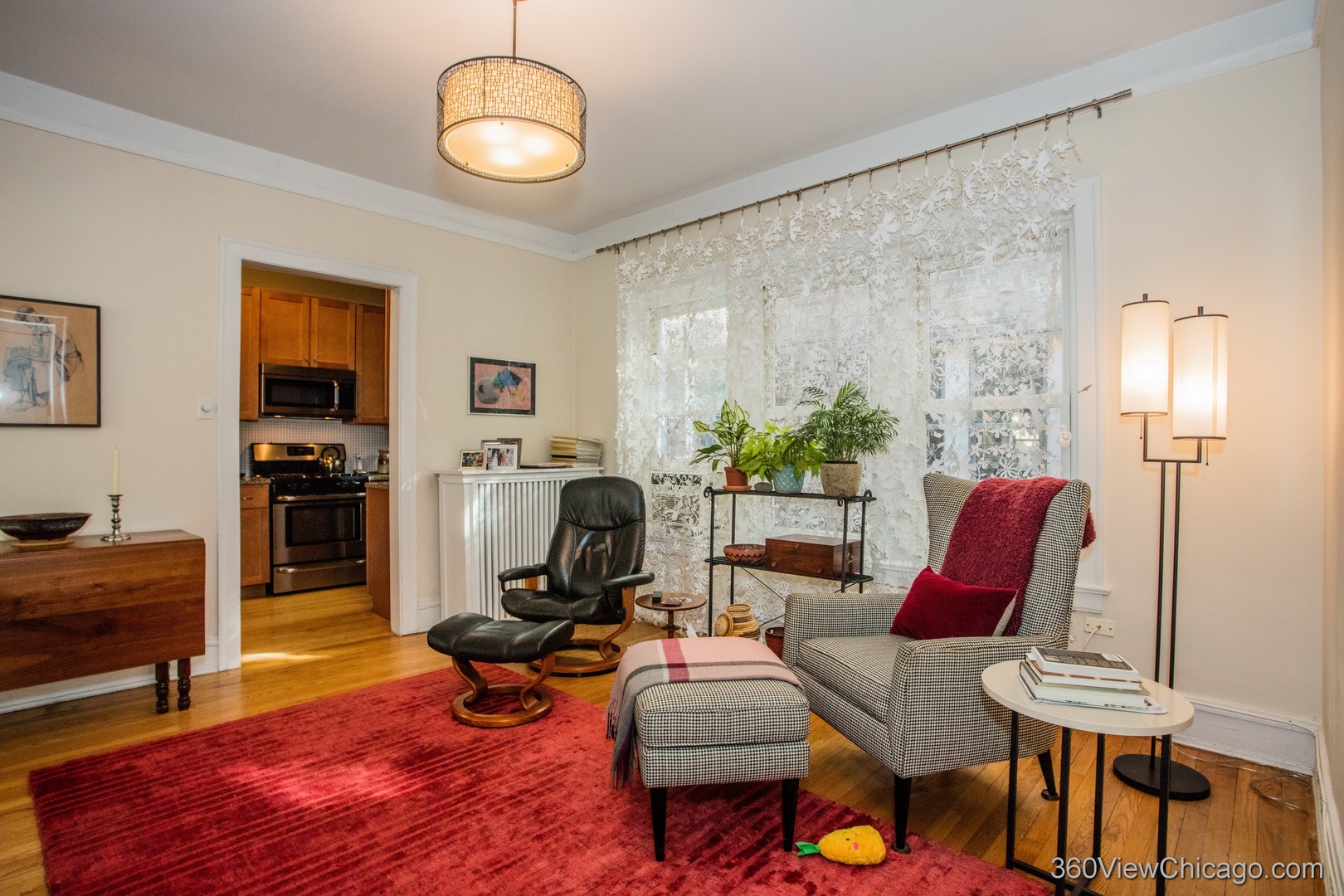 546 West Brompton Avenue, Unit 2S Chicago, IL 60657 - Photo 14 of 17 a living room with furniture rug and window