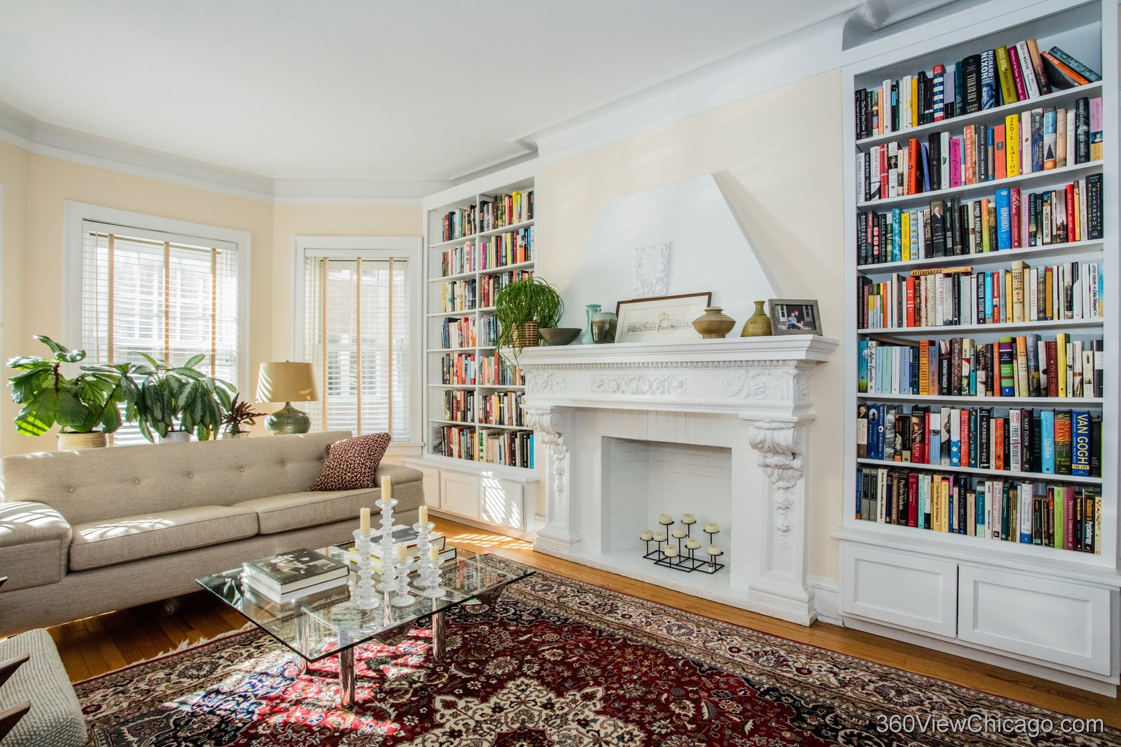 546 West Brompton Avenue, Unit 2S Chicago, IL 60657 - Photo 6 of 17 a living room with furniture and a book shelf