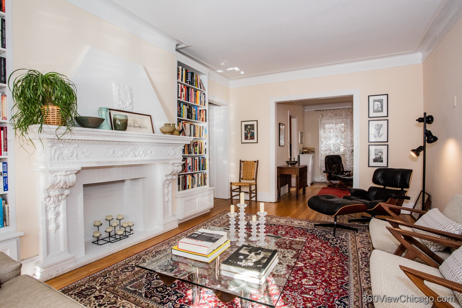 546 West Brompton Avenue, Unit 2S Chicago, IL 60657 - Photo 8 of 17 a living room with furniture and a fireplace