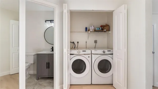 a utility room with dryer and washer