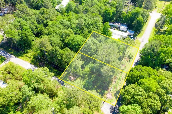 a backyard of a house with lots of green space and outdoor space