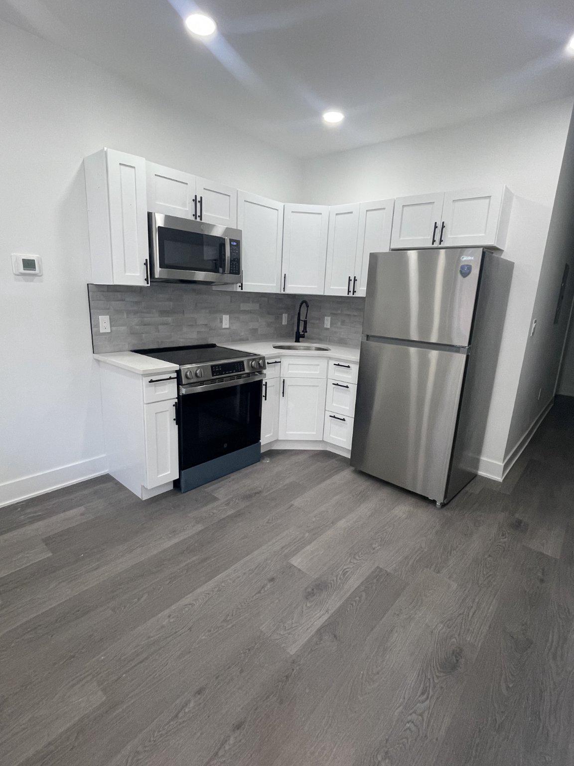 5719 Cambridge Street, Unit 1 Philadelphia, PA 19131 - Photo 1 of 6 Modern Updated Kitchen