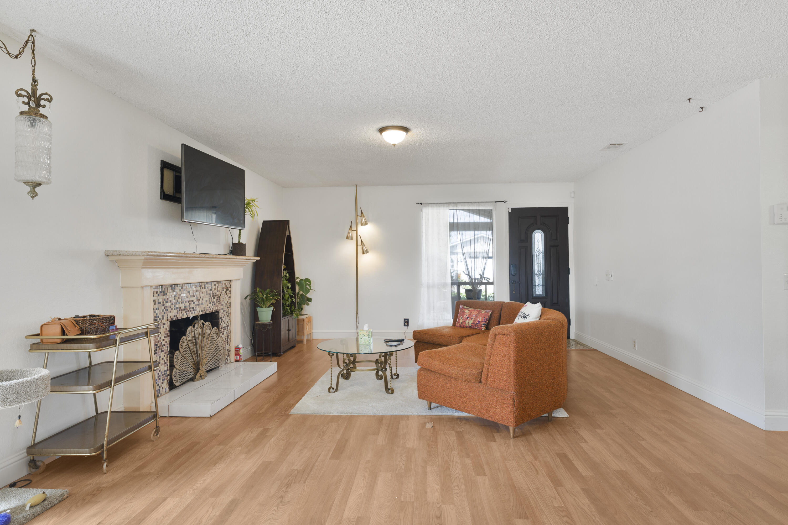 908 Northpoint Place Lompoc, CA 93436 - Photo 5 of 21 a living room with furniture and a fireplace