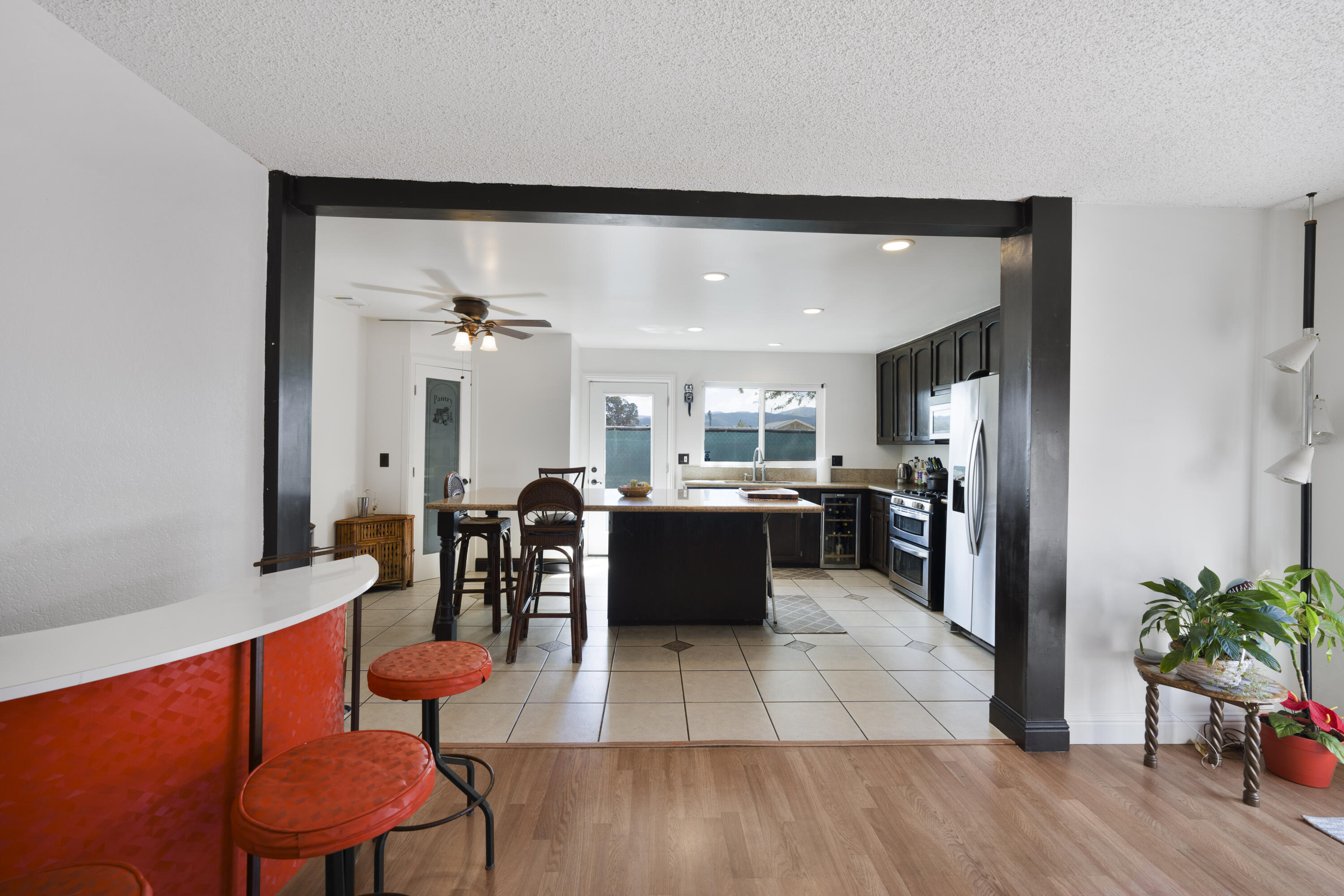 908 Northpoint Place Lompoc, CA 93436 - Photo 6 of 21 a large kitchen with a table and chairs