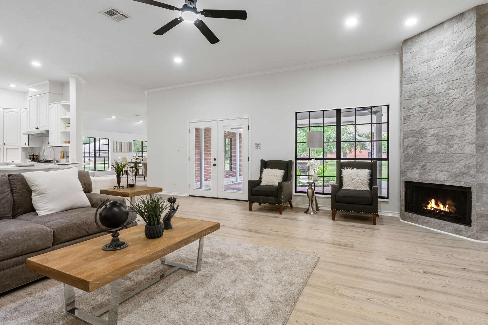 10 Autumn Oaks Drive Baytown, TX 77521 - Photo 17 of 38 a living room with furniture and a fireplace