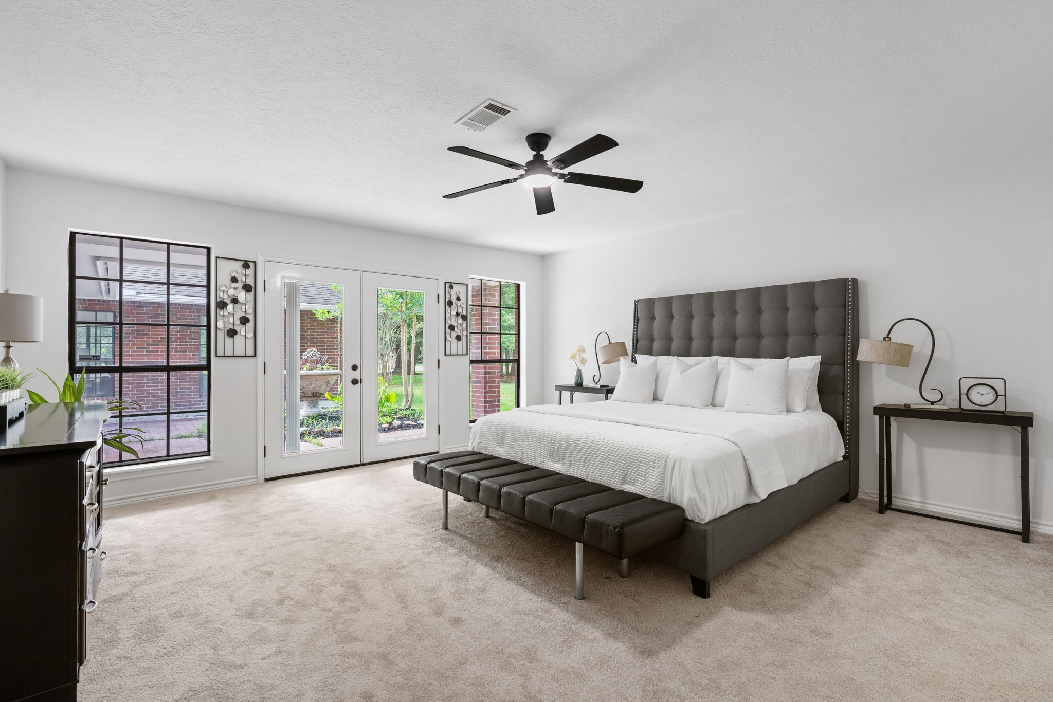 10 Autumn Oaks Drive Baytown, TX 77521 - Photo 24 of 38 a spacious bedroom with a bed and large window