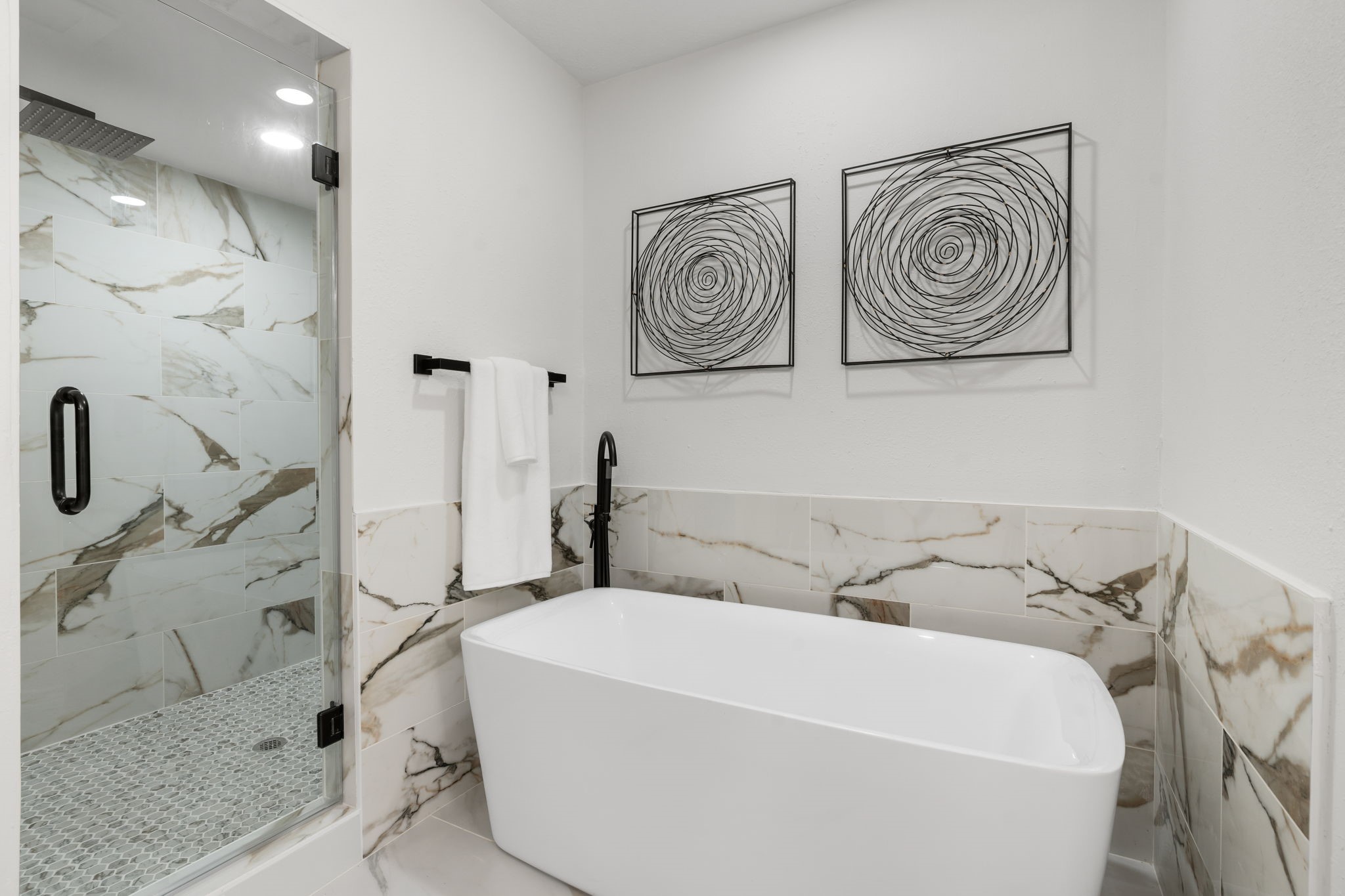 10 Autumn Oaks Drive Baytown, TX 77521 - Photo 29 of 38 a bathroom with a bathtub and shower