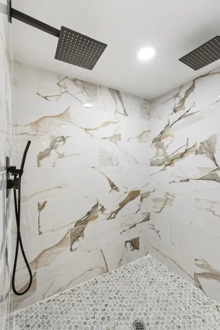 a view of a hallway with white walls