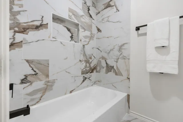 a view of a garden with an outdoor seating