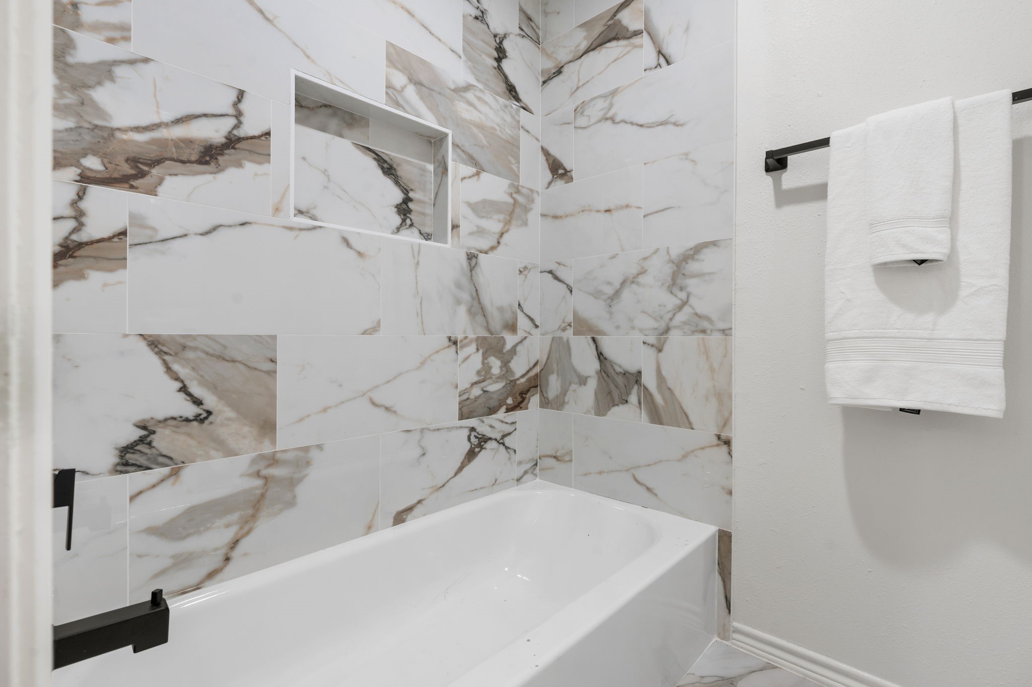 10 Autumn Oaks Drive Baytown, TX 77521 - Photo 36 of 38 a bathroom with a bathtub and shower