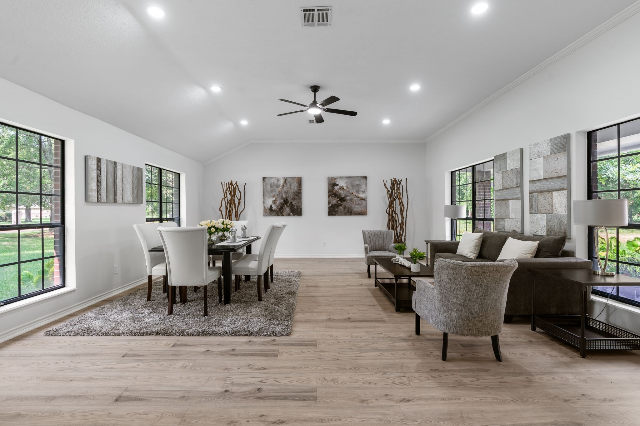 10 Autumn Oaks Drive Baytown, TX 77521 - Photo 7 of 38 a living room with furniture dining table and a window