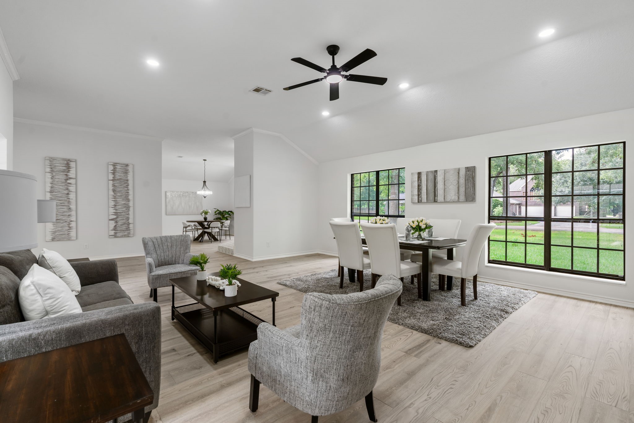 10 Autumn Oaks Drive Baytown, TX 77521 - Photo 10 of 38 a living room with furniture and a large window with wooden floor