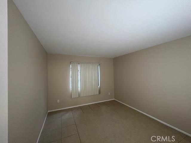 1806 North Fairview Street, Unit Q Santa Ana, CA 92706 - Photo 9 of 10 a view of an empty room and window