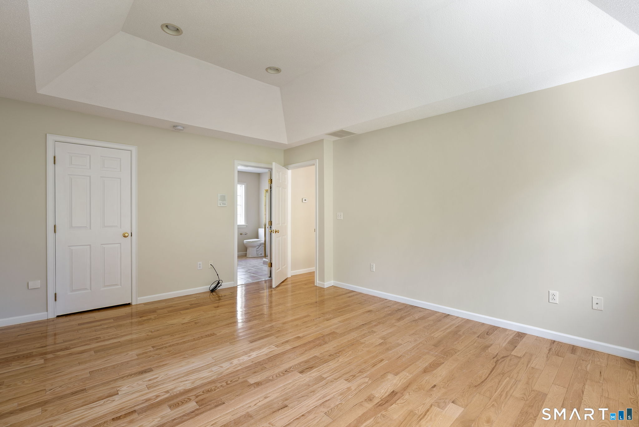 555 Waterville Road Avon, CT 06001 - Photo 31 of 40 a view of empty room with wooden floor