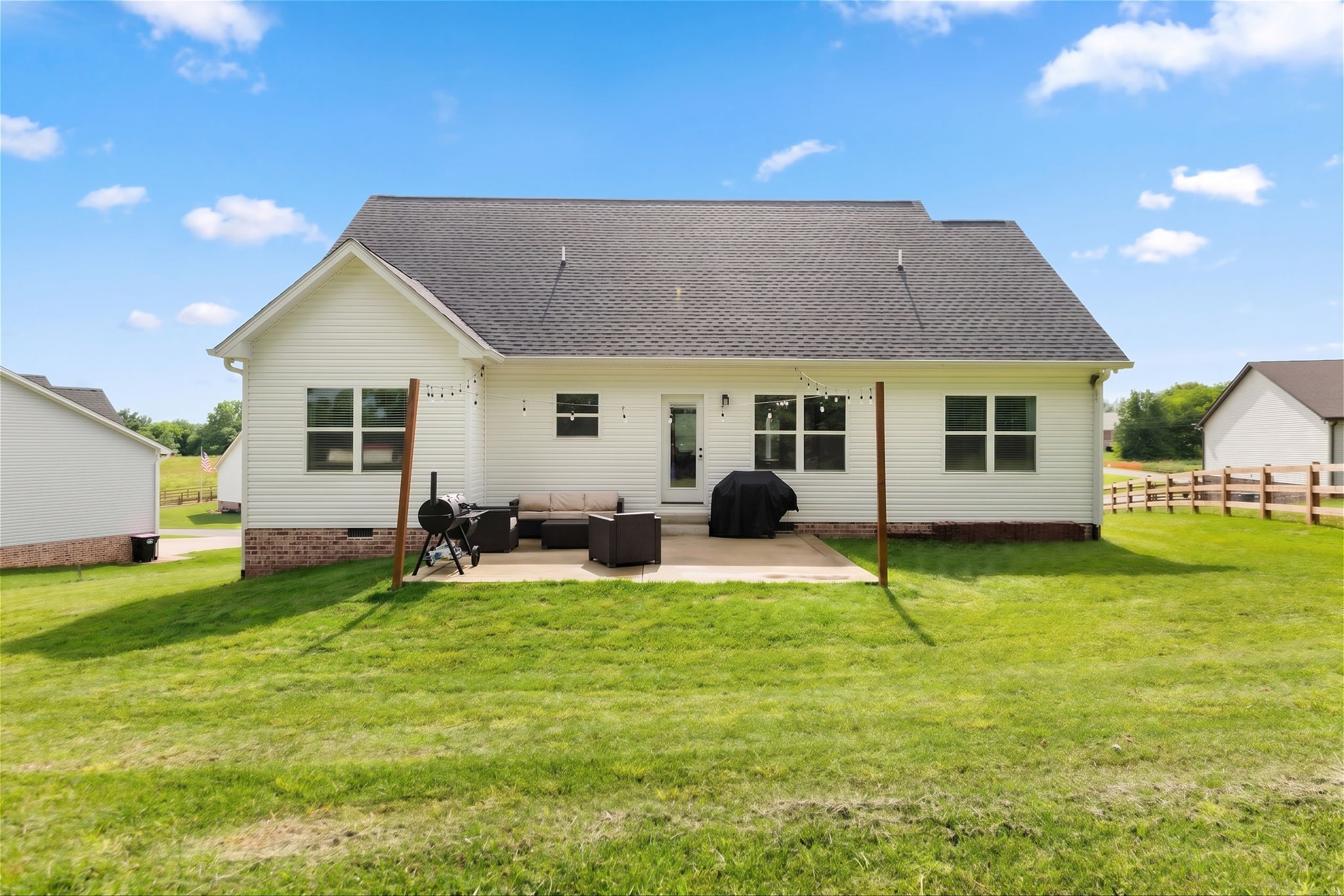 1578 Angus Way Greenbrier, TN 37073 - Photo 45 of 45 a view of a house with a backyard porch and sitting area