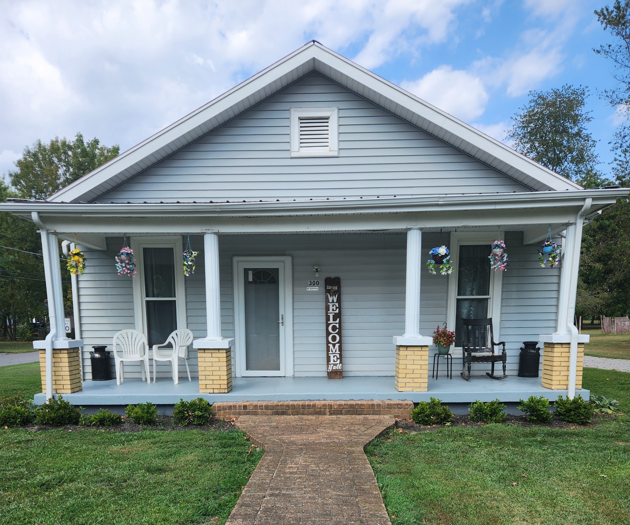 300 South Russell Street Portland, TN 37148 - Photo 1 of 14 a front view of a house with a yard