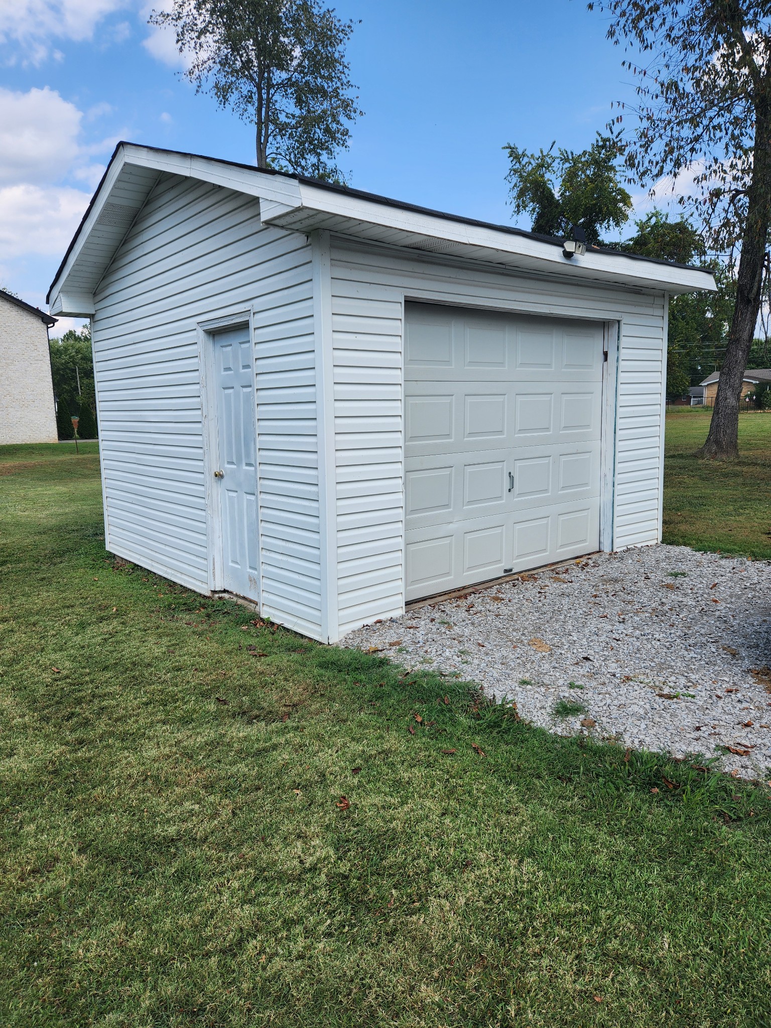 300 South Russell Street Portland, TN 37148 - Photo 2 of 14 a front view of a house with a yard