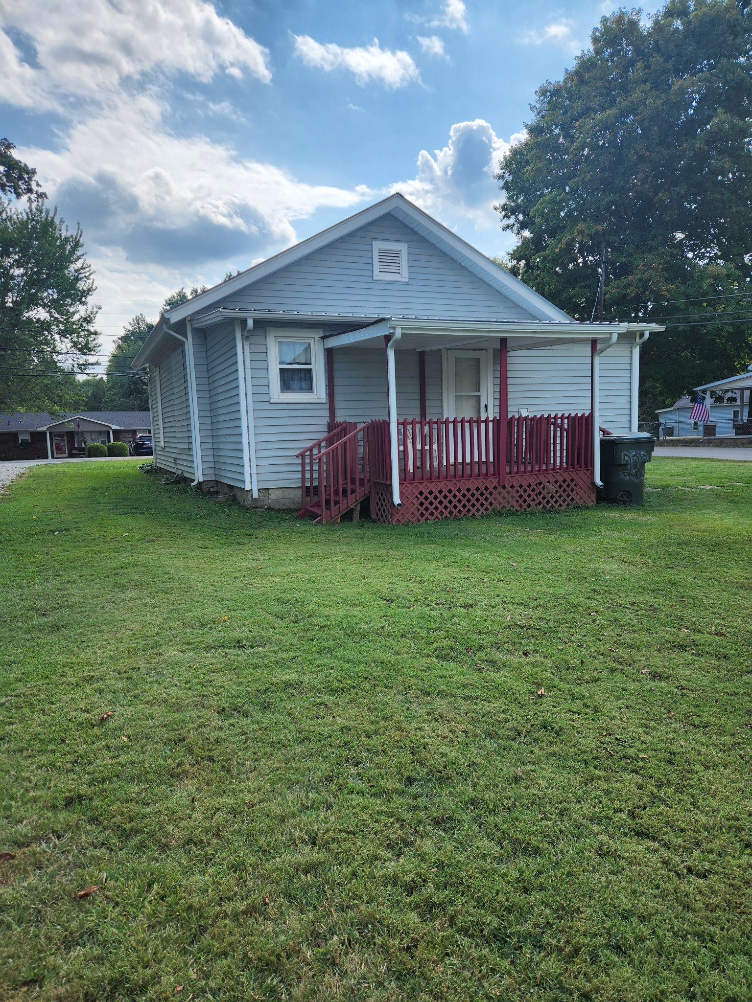 300 South Russell Street Portland, TN 37148 - Photo 3 of 14 a view of a house with a yard and deck
