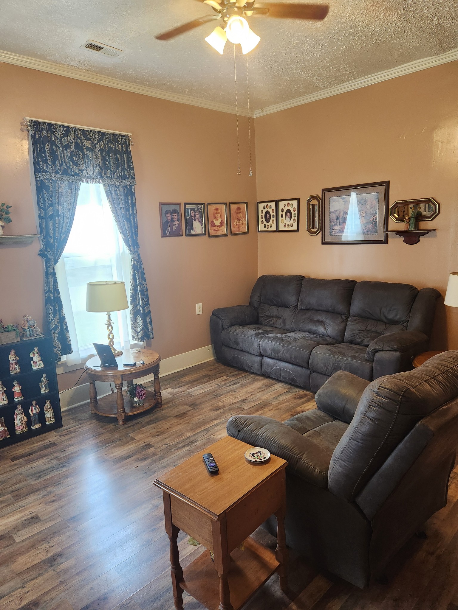 300 South Russell Street Portland, TN 37148 - Photo 9 of 14 a living room with furniture and a wooden floor