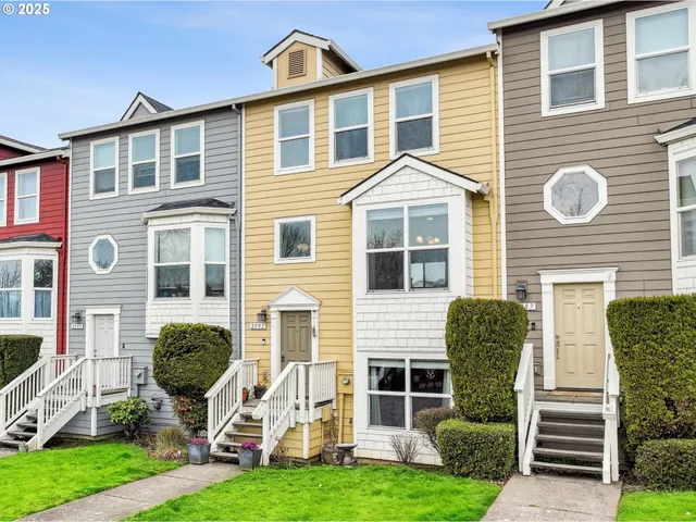 a front view of a house with a yard and porch