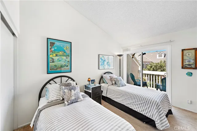 a bedroom with bed and a window