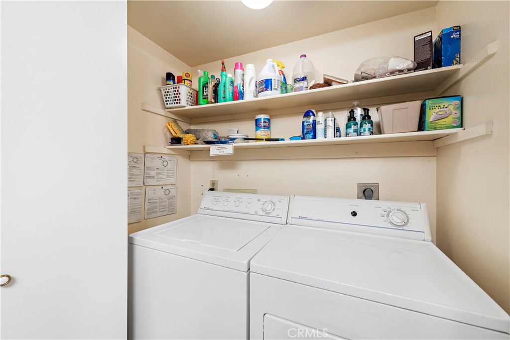 34110 Selva Road, Unit 321 Dana Point, CA 92629 - Photo 29 of 29 a utility room with dryer and washer