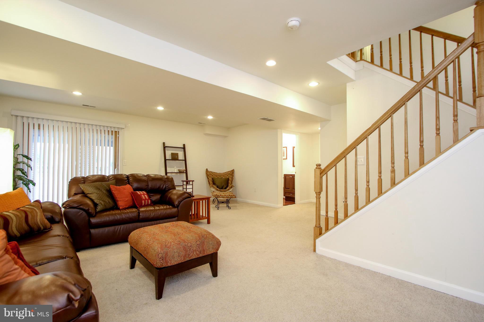 1432 Grimm Road Severn, MD 21144 - Photo 15 of 23 Open Family Room w/ walkout sliders in Bsmt