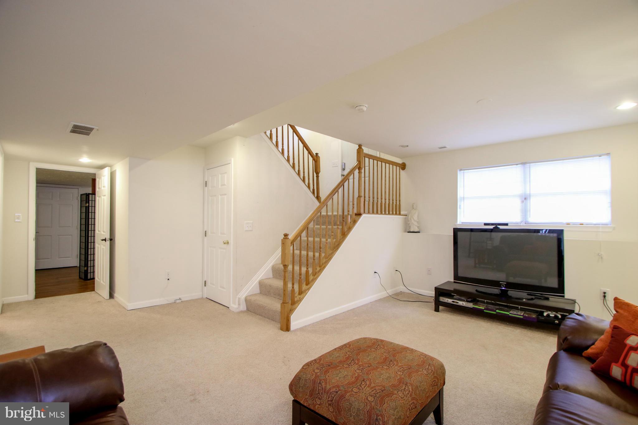 1432 Grimm Road Severn, MD 21144 - Photo 16 of 23 Open Family Room in Basement