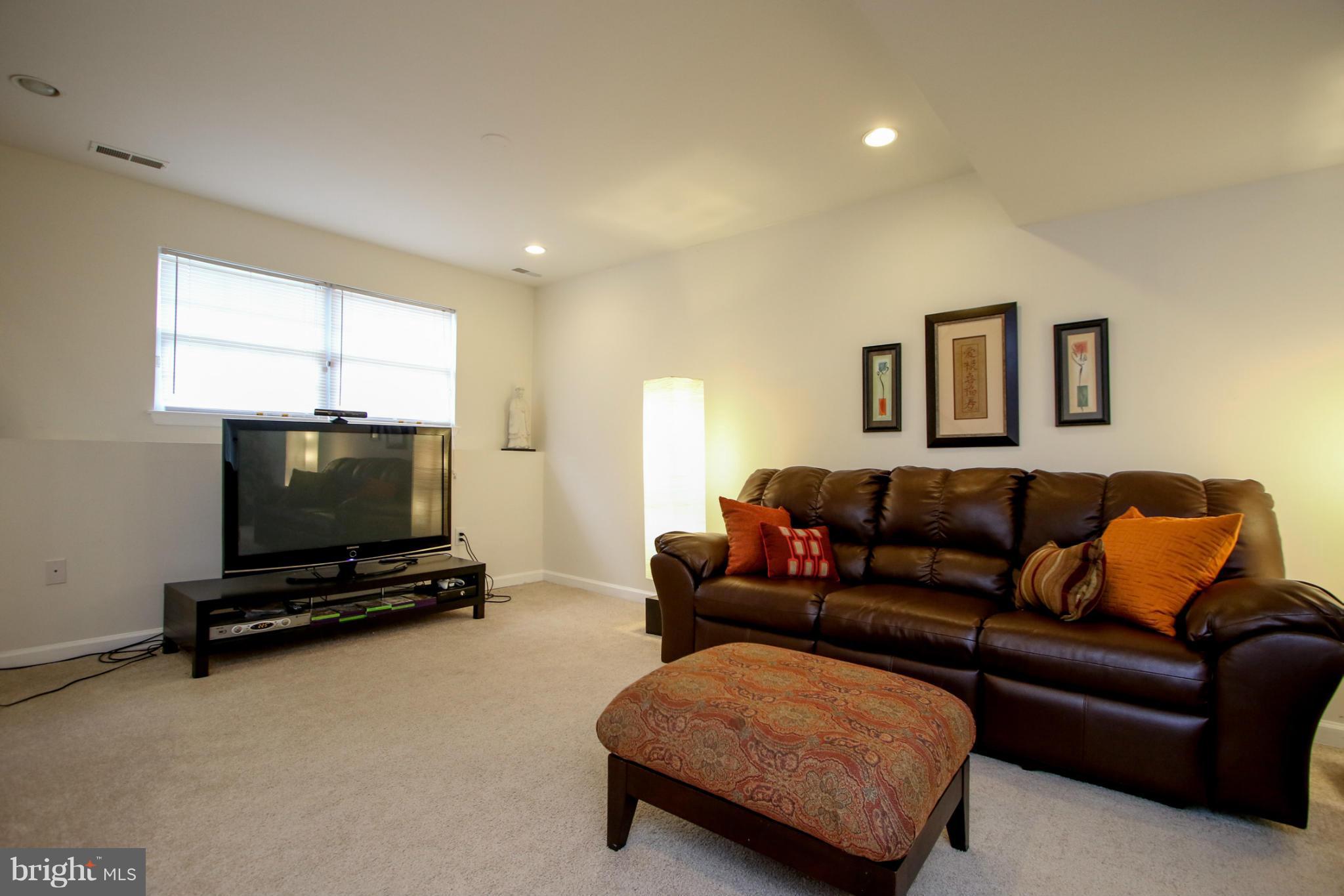 1432 Grimm Road Severn, MD 21144 - Photo 17 of 23 Open Family Room in Basement