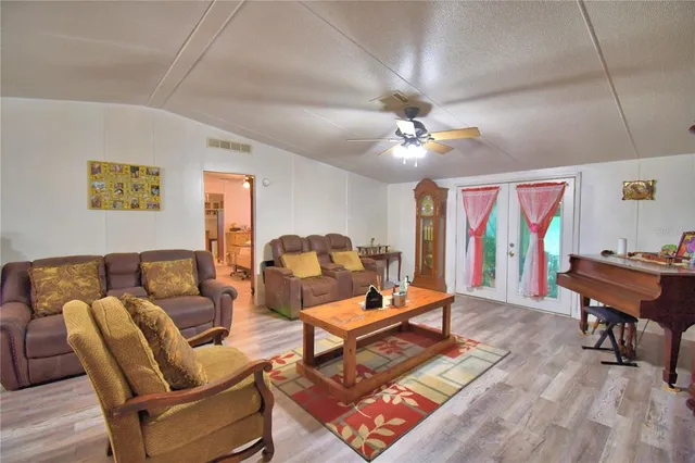 a bedroom with a bed and a dresser in it