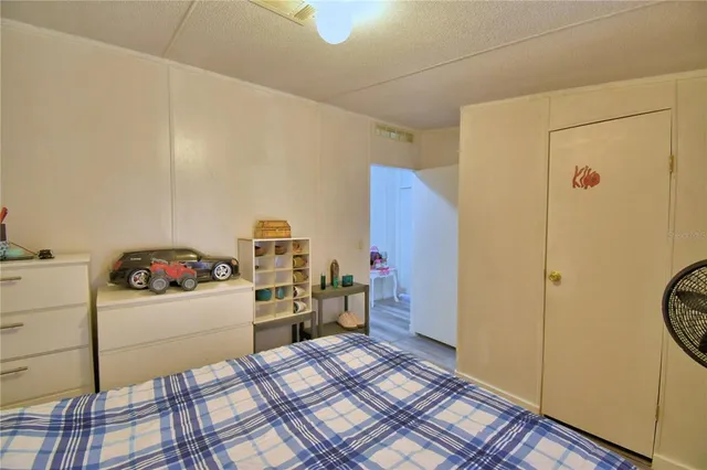 a kitchen with granite countertop a sink appliances and cabinets