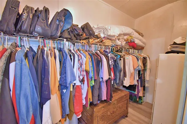 a view of a yard with swimming pool and outdoor seating