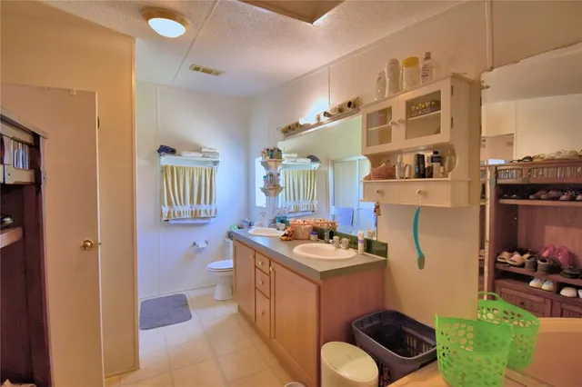 a view of a couches and dinning table in the balcony