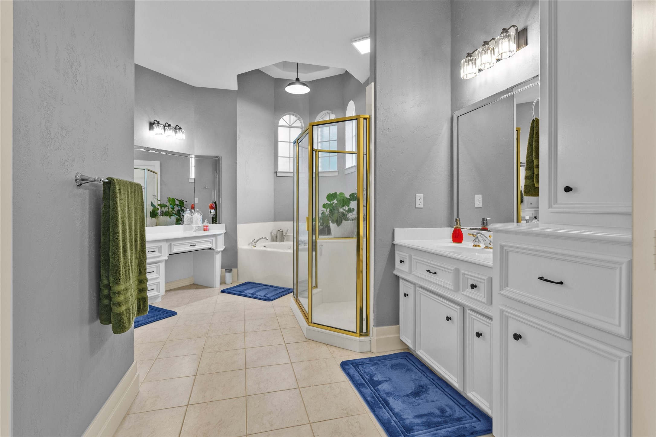 8314 Drew Haven Lane Spring, TX 77379 - Photo 24 of 49 The ensuite bathroom has a separate shower and soaking tub.