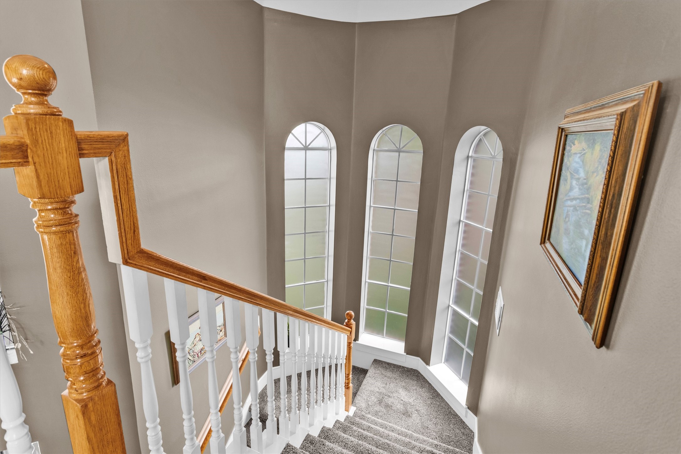 8314 Drew Haven Lane Spring, TX 77379 - Photo 27 of 49 The grand staircase lends elegance to the home.