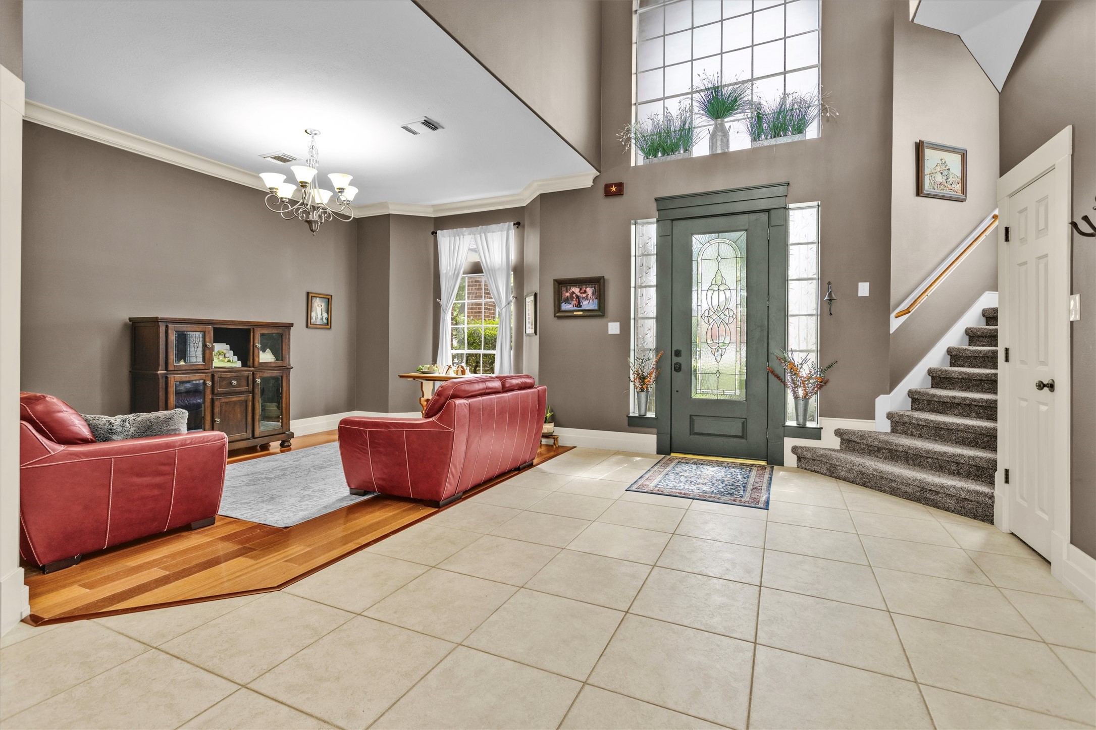 8314 Drew Haven Lane Spring, TX 77379 - Photo 6 of 49 The high ceiling in the entry boasts large windows that provided plenty of natural light.