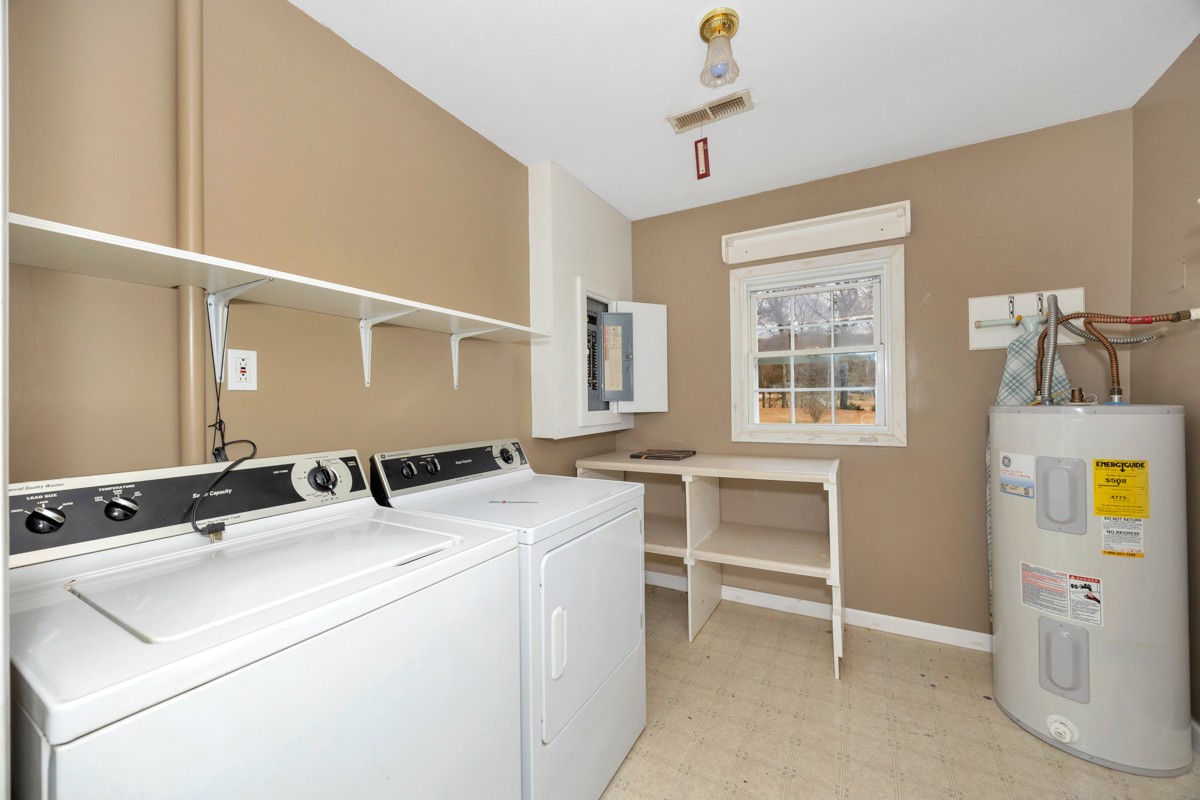 560 Old Poplar School Road Prospect, TN 38477 - Photo 12 of 28 a utility room with dryer and washer