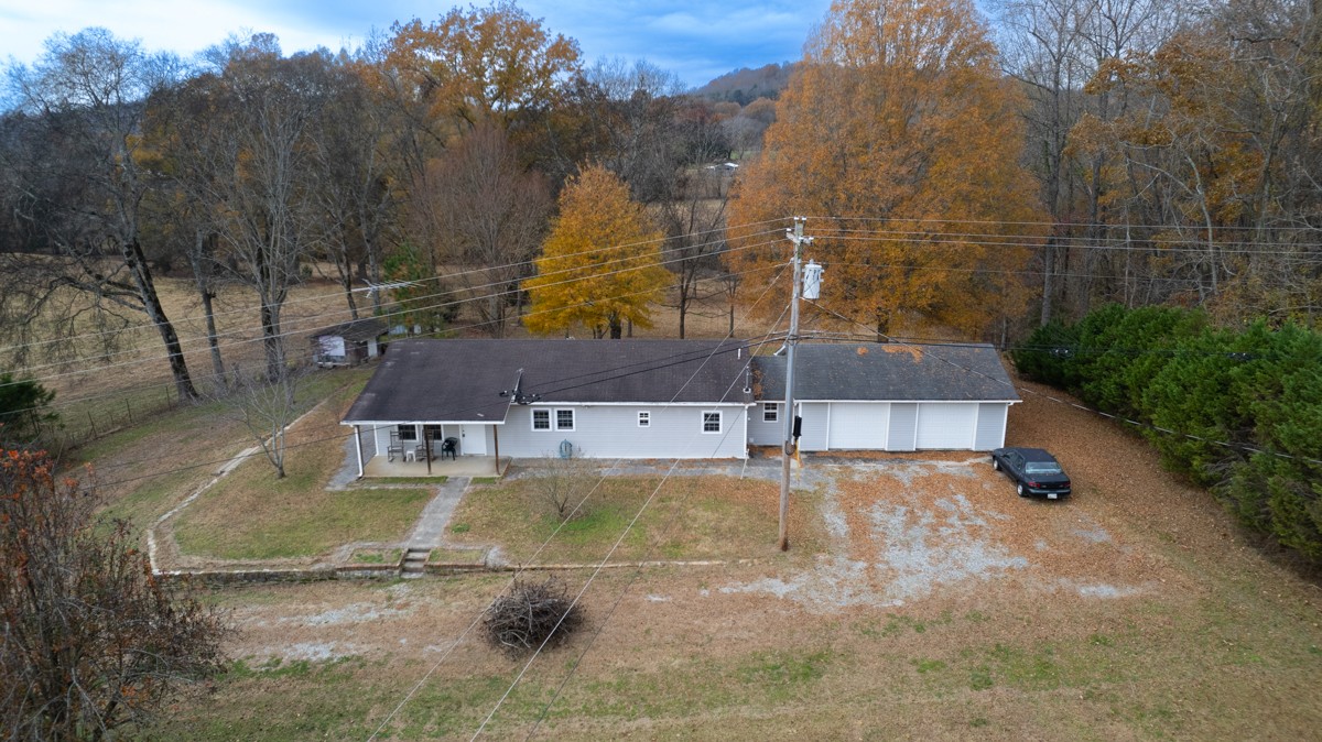560 Old Poplar School Road Prospect, TN 38477 - Photo 17 of 28 a view of a swimming pool with a yard