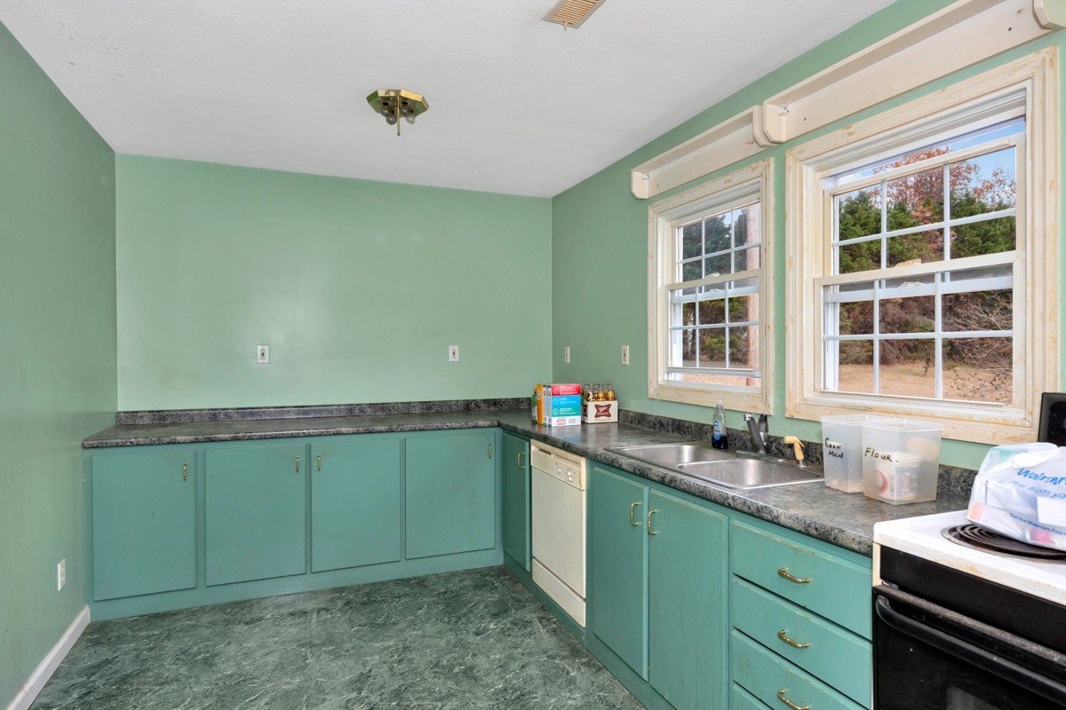 560 Old Poplar School Road Prospect, TN 38477 - Photo 5 of 28 a kitchen with a sink and a window