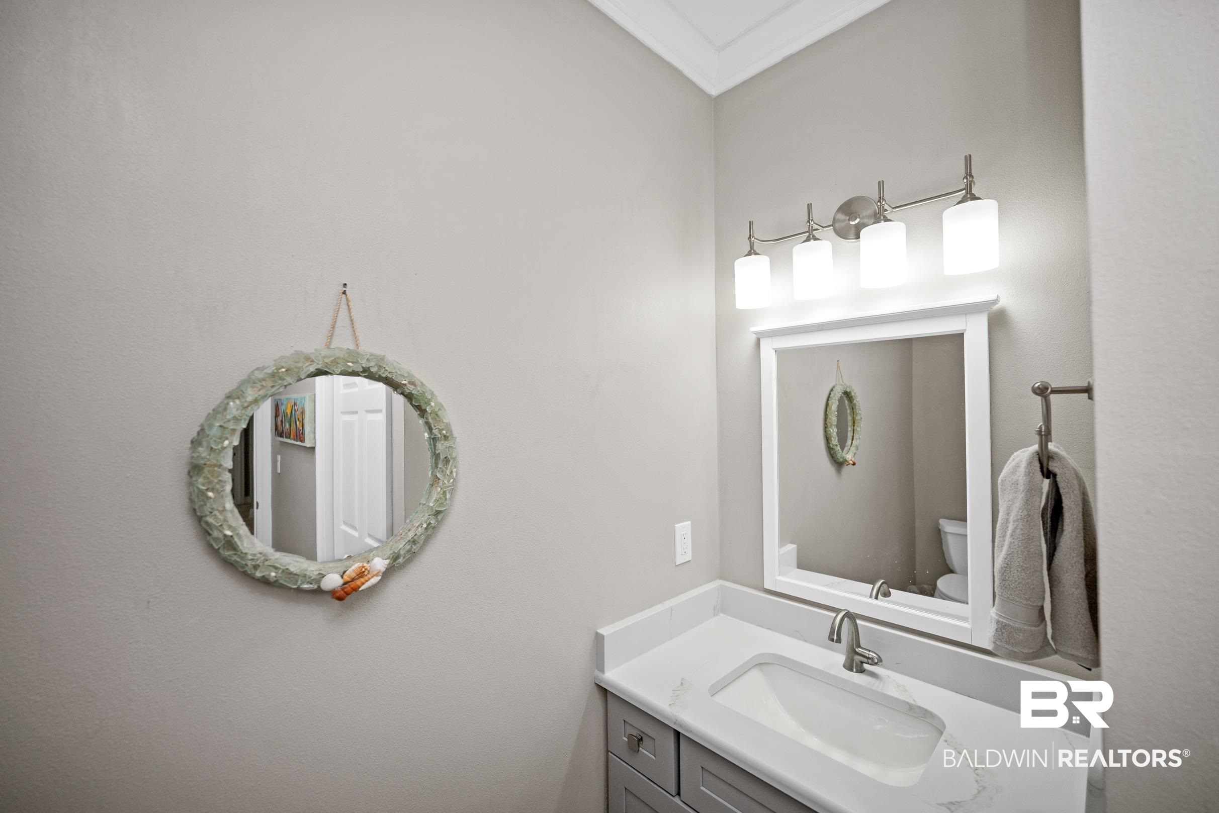 5217 Greentree Road Orange Beach, AL 36561 - Photo 48 of 58 Bathroom featuring vanity and toilet
