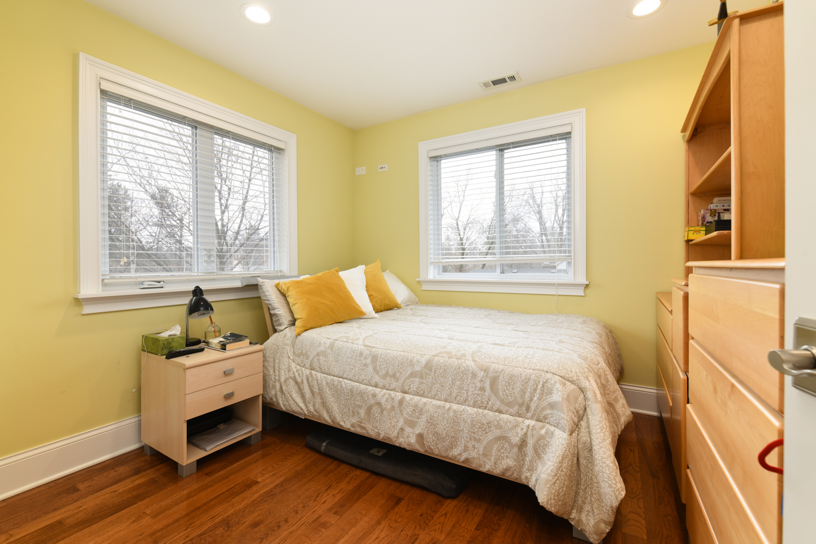 111 Grace Lane Fox River Grove, IL 60021 - Photo 22 of 33 a bedroom with a bed and a window