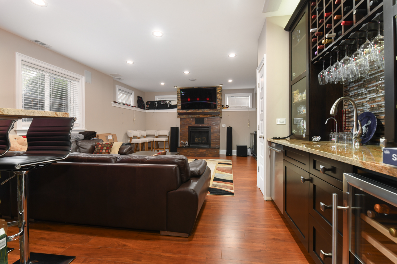 111 Grace Lane Fox River Grove, IL 60021 - Photo 29 of 33 a living room with stainless steel appliances kitchen island granite countertop a stove and a sink