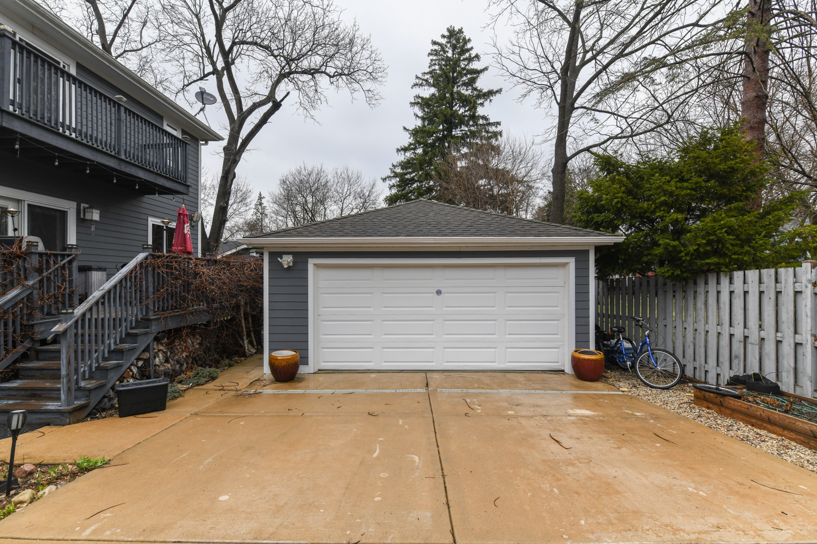 111 Grace Lane Fox River Grove, IL 60021 - Photo 33 of 33 a view of garage and wooden fence